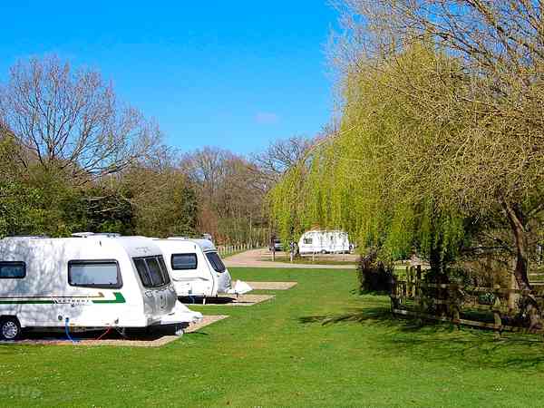 FHU cement/asphalt and grass travel trailer site (super, adults only)