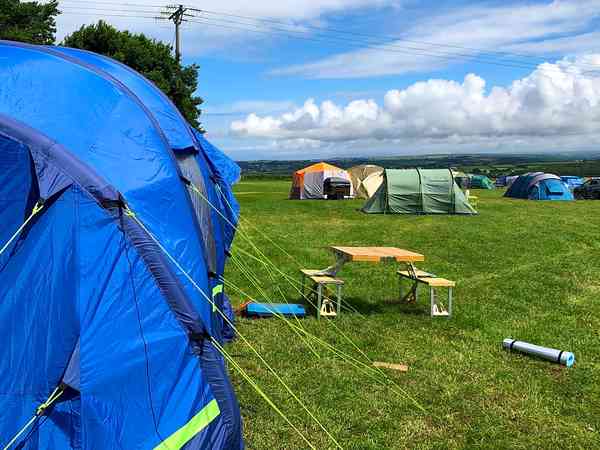 Non-electric grass tent or trailer tent pitch