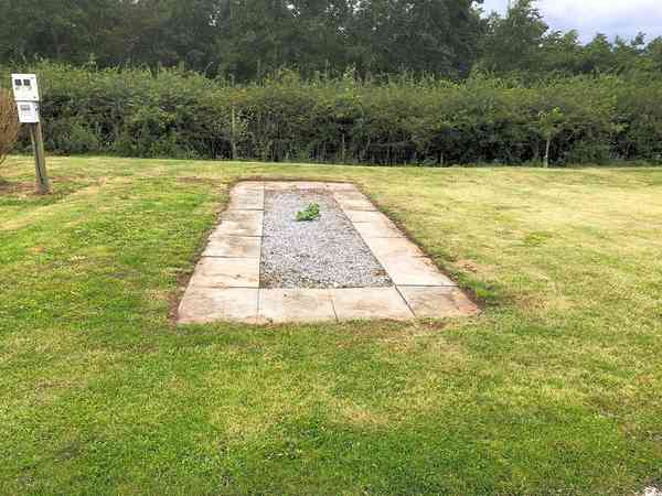 Electric hardstanding and grass pitch