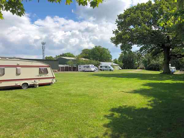 Electric grass touring caravan pitch (two man)