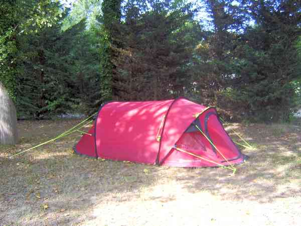 Grass pitch with trees for shade Grass pitch with trees for shade