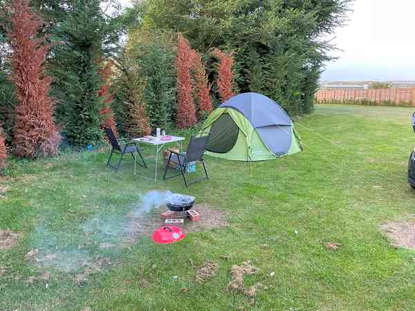 Non-electric grass tent or trailer tent pitch
