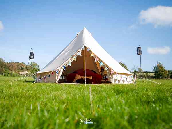 View of the interior of a bell tent (illustrative photo only - decor subject to change) View of the interior of a bell tent (illustrative photo only - decor subject to change)