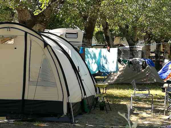 Powered asphalt and grass tent or trailer tent site