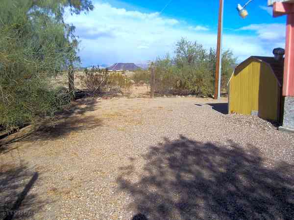 Primitive earth tent or trailer tent site