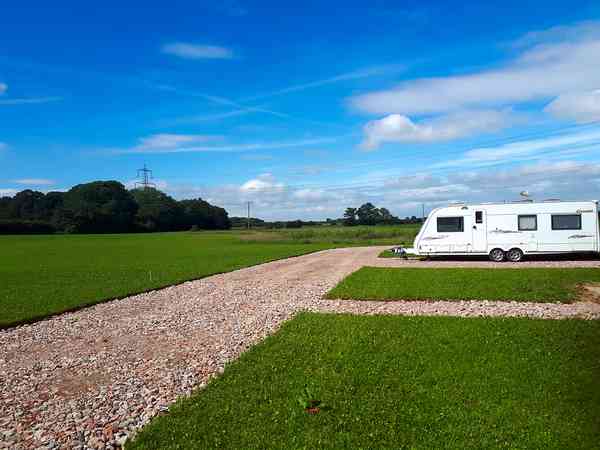 Electric grass touring pitch (maximum 3 adults)