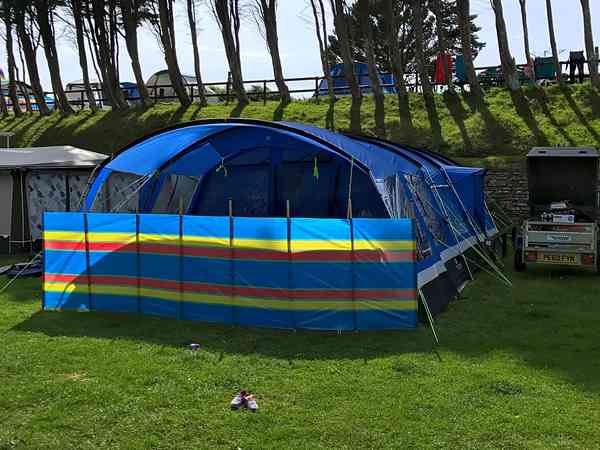 Electric grass tent pitch