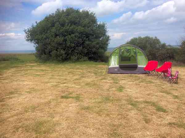 Non-electric grass tent or trailer tent pitch