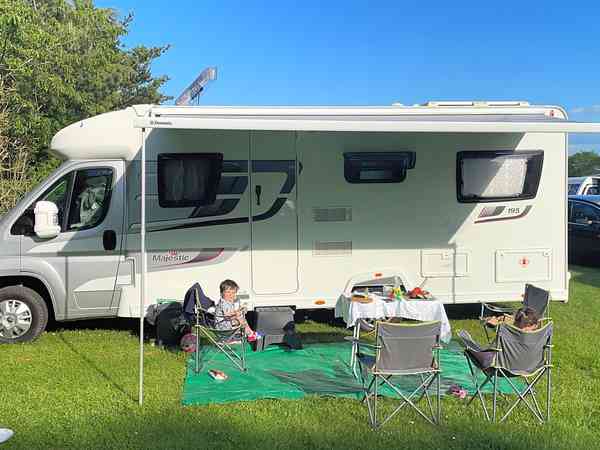 Fully-serviced hardstanding and grass pitch