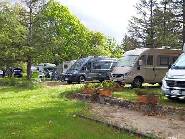 Powered grass tent or trailer tent site