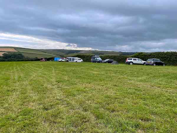 Primitive grass and earth tent, trailer tent or campervan site