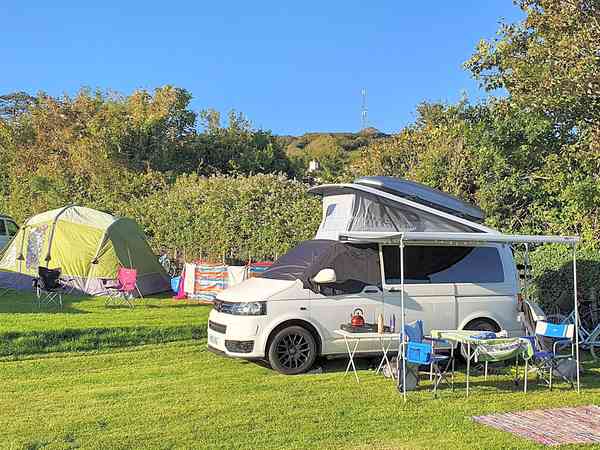 Electric optional grass campervan pitch (maximum 6 metres)