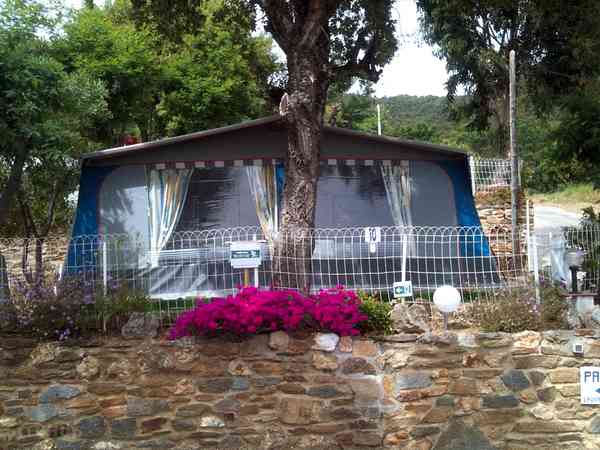 Front view of the vintage caravan and awning Front view of the vintage caravan and awning