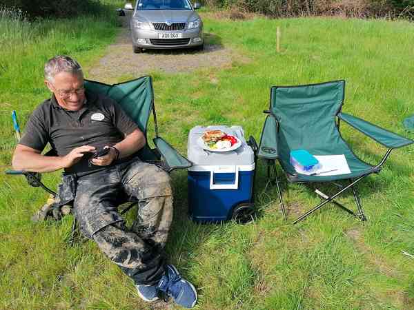 Primitive grass and earth tent or trailer tent site