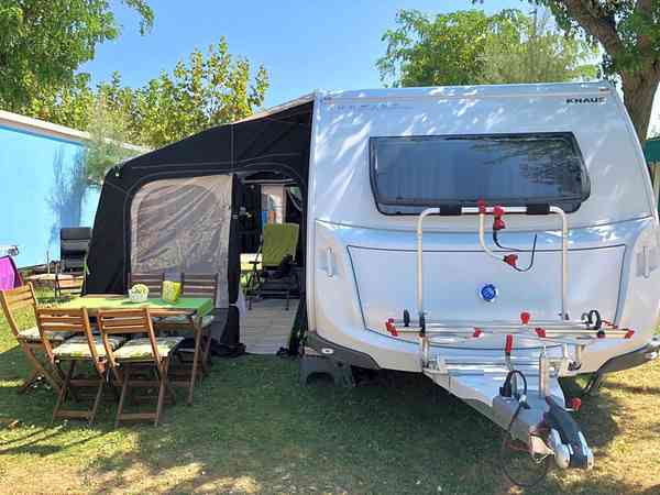 Electric grass and gravel touring caravan pitch