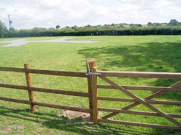 Tranquil site overlooking open countryside Tranquil site overlooking open countryside
