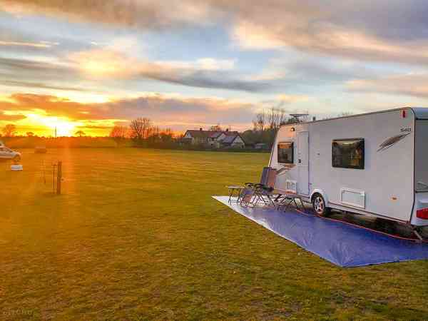 Powered grass caravan site