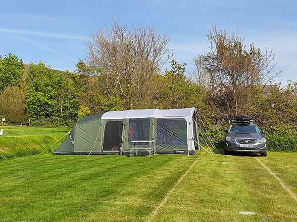 Electric optional grass tent or trailer tent pitch