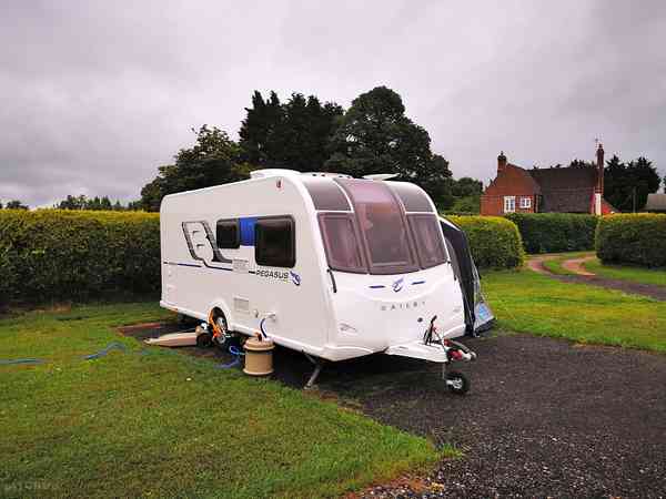 Fully-serviced hardstanding and grass touring pitch (water hook-up)