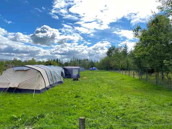 Non-electric grass tent pitch