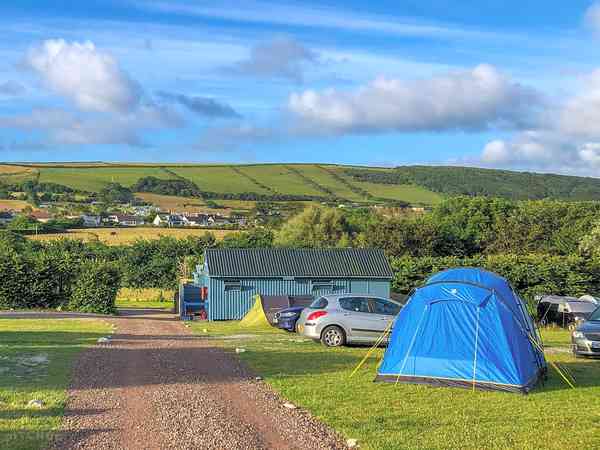 Non-electric grass tent or trailer tent pitch