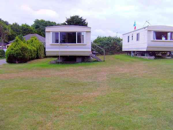Outside area: with a table, fold up chairs and a barbecue Outside area: with a table, fold up chairs and a barbecue