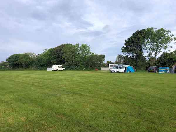 Fully-serviced grass and gravel touring pitch