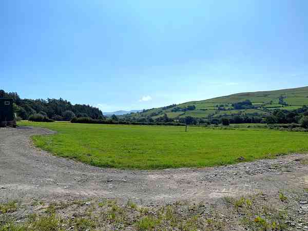 Primitive grass tent or trailer tent site