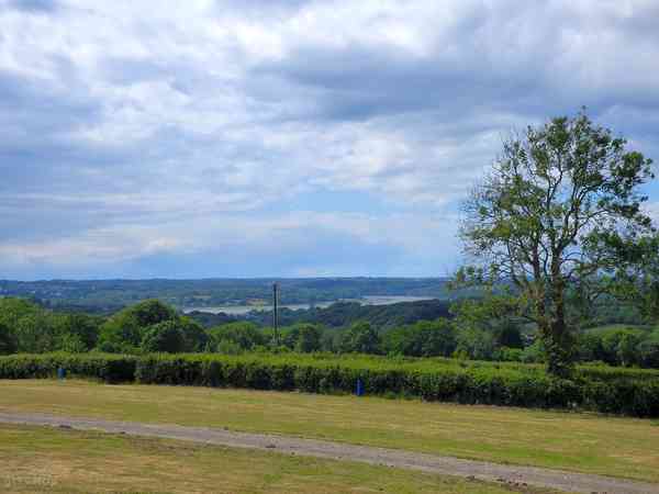 Grass pitches with rural views Grass pitches with rural views