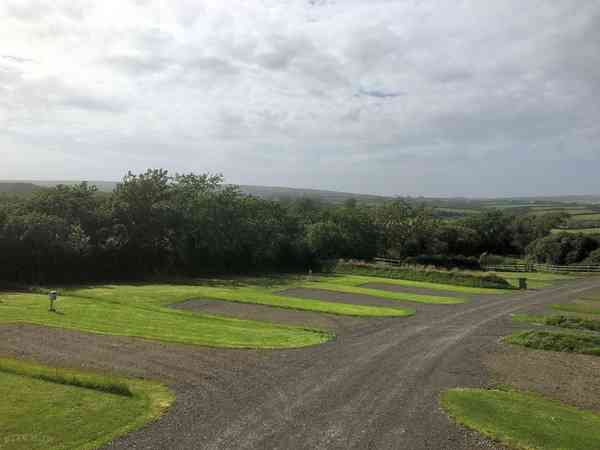 Manorbier electric optional hardstanding and grass touring pitch