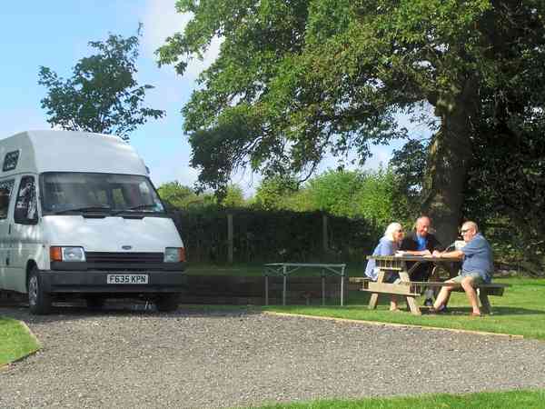Touring pitch with grass for awnings and gazebos Touring pitch with grass for awnings and gazebos