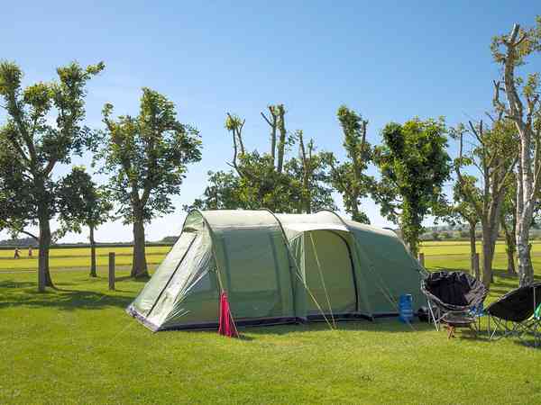 Unpowered grass tent or trailer tent site