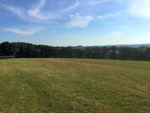 Non-electric grass and earth tent or motorhome pitch