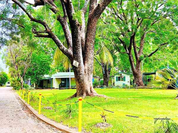 Powered gravel and earth caravan site (Private restroom amenities)