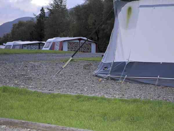 Electric grass and gravel touring pitch