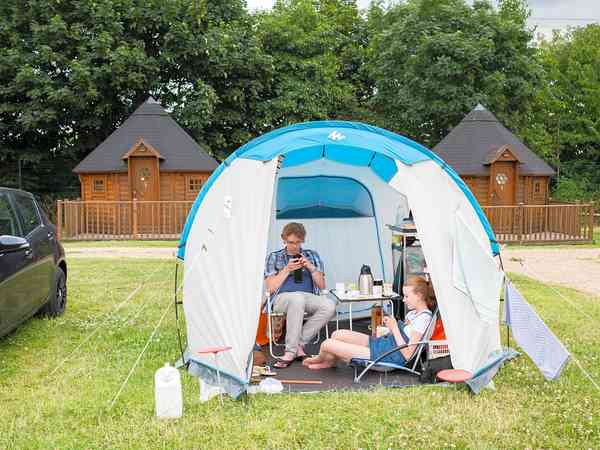 Electric optional grass tent pitch