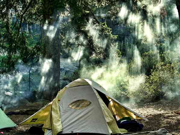 Non-electric grass and earth tent pitch