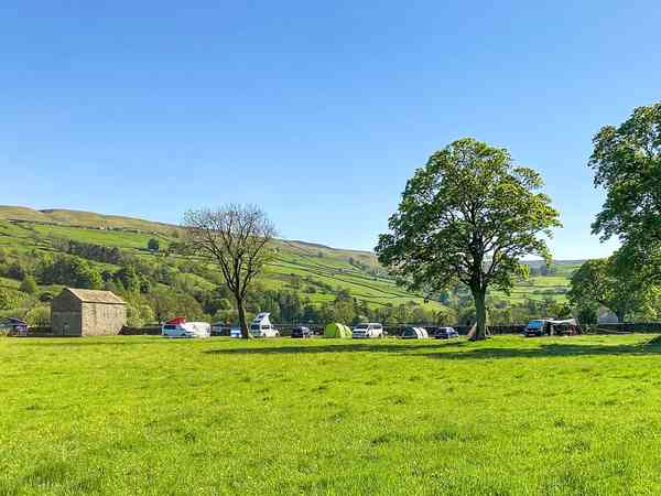 Field non-electric grass tent or trailer tent pitch
