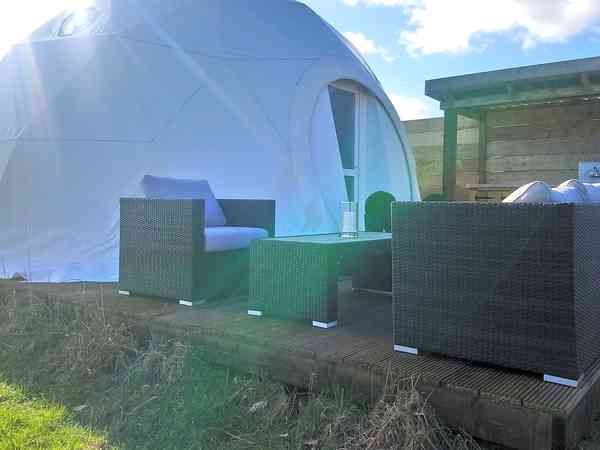Outside kitchen and seating area Outside kitchen and seating area