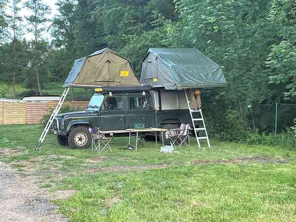 Powered grass tent site