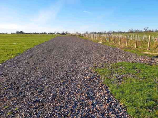 Fully-serviced grass and gravel touring pitch