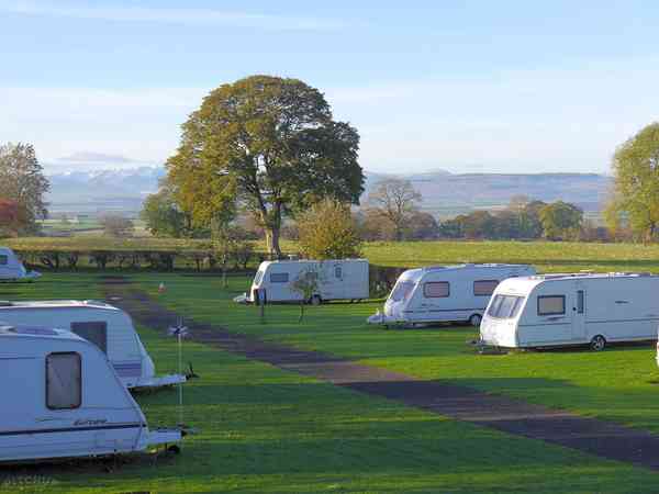 Electric grass and gravel touring pitch