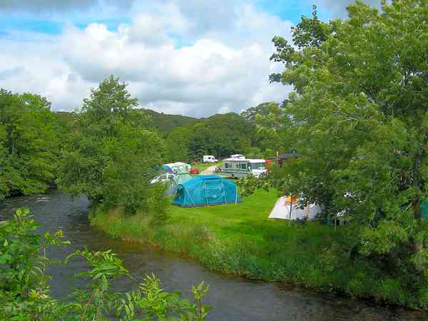 Electric hardstanding and grass tent or motorhome pitch