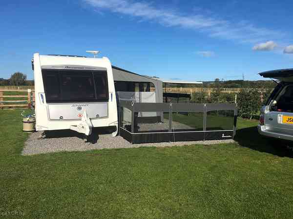Fully-serviced grass and gravel touring pitch (super)