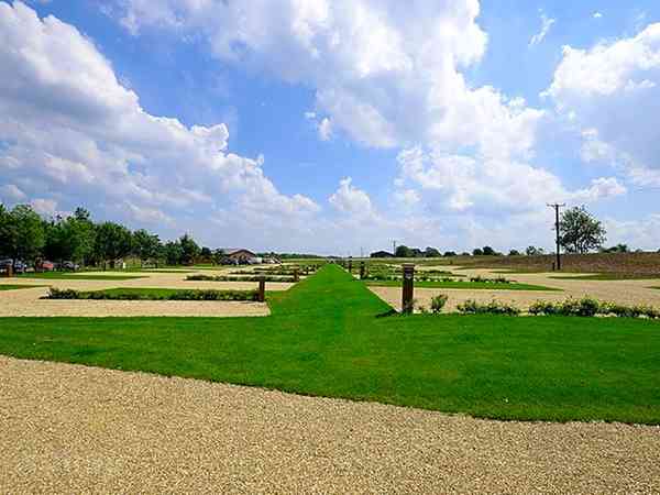 Fully-serviced hardstanding touring pitch (2 adults and 2 children)
