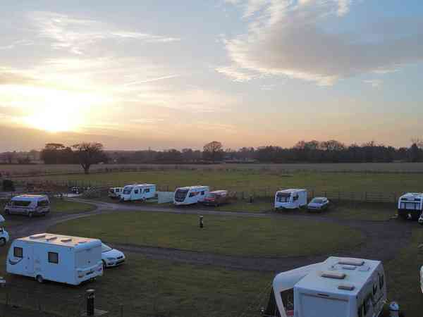 Fully-serviced grass touring pitch