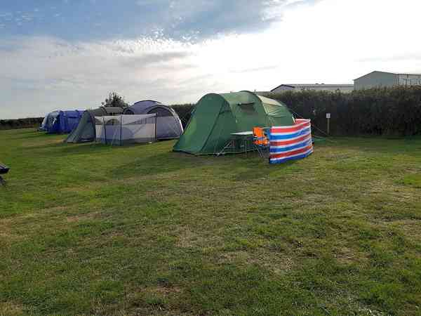 Non-electric grass tent pitch