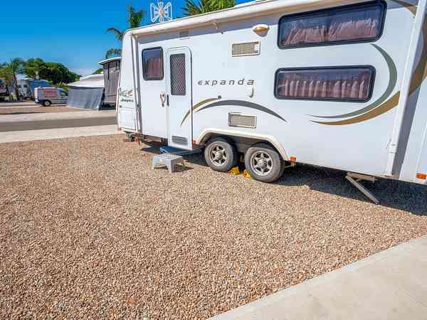 Fully-serviced gravel and concrete motorhome site