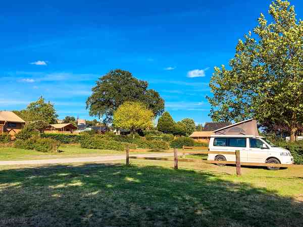 Unpowered concrete and grass site