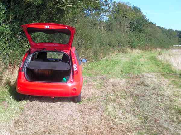 Green non-electric grass tent pitch